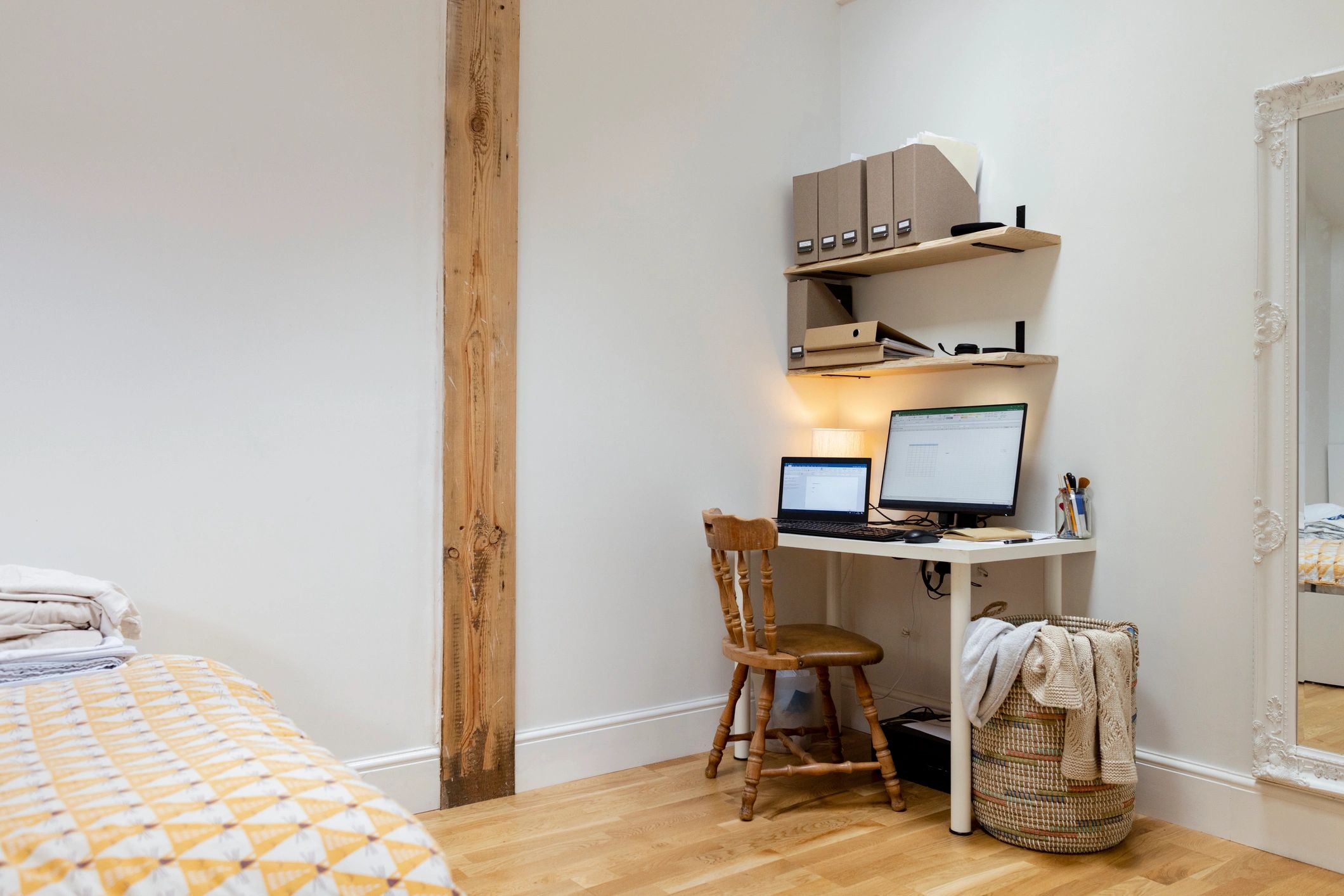 Tidy home office with computer monitors and desk setup