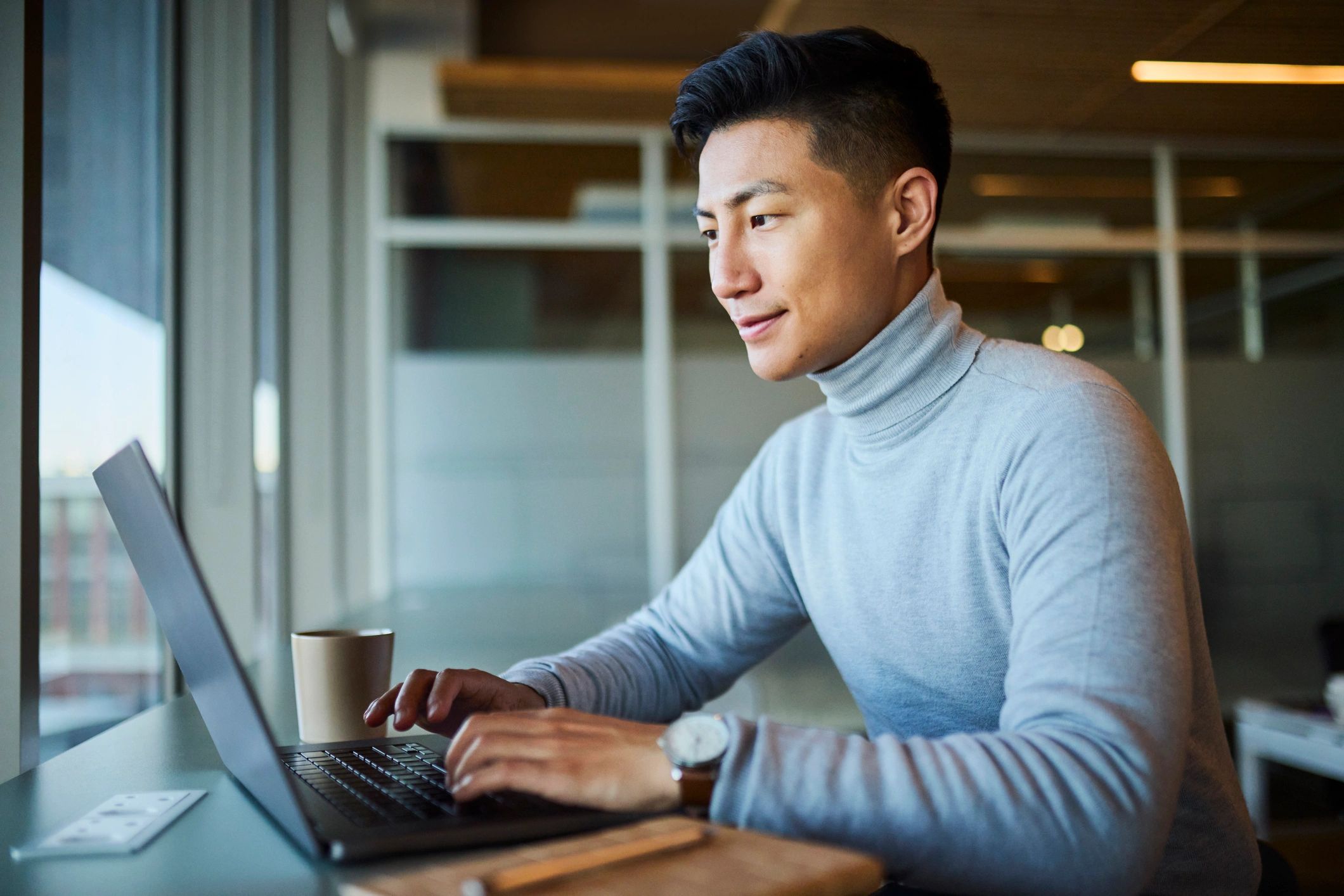 Professional using a laptop for online learning